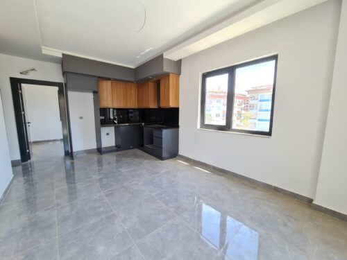 Продажа новой квартиры 1+1 в Оба (Алания, Турция)