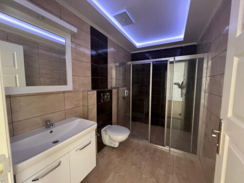 Двухуровневые апартаменты 4+1 Тосмур 200м от моря купить квартиру в
