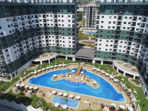 Квартира в Алании, 1+1 (Махмутлар, Serenity Residence), высокий этаж, вид на инфраструктуру