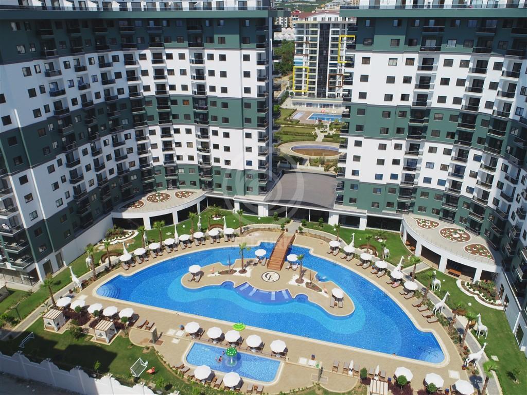 Квартира в Алании, 1+1 (Махмутлар, Serenity Residence), высокий этаж, вид на инфраструктуру