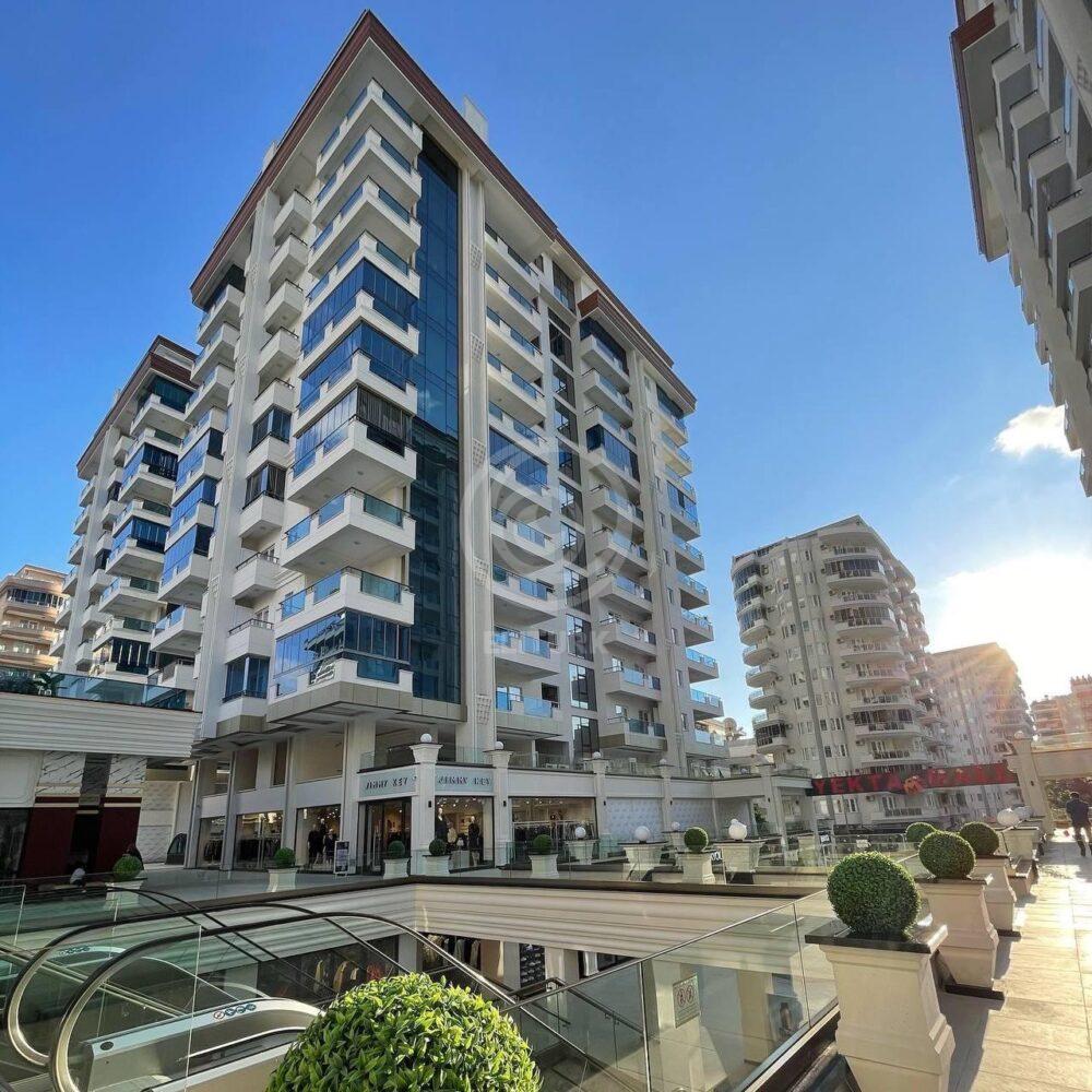 Купить квартиру в Махмутларе, 1+1: Yekta Trade Center, меблировка и застекленный балкон