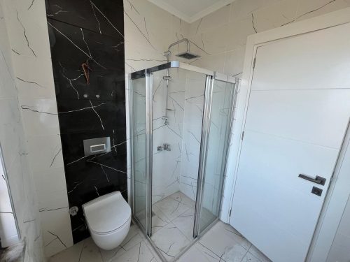 Купить квартиру в Алании, Турция: вид на море, маяк и